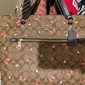 Brown and pink large coach purse , brand new never used!!